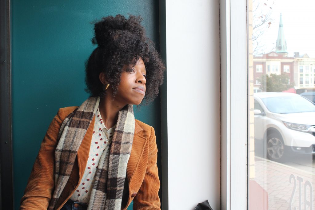 Dorsey looks out a window in Racine, Wisconsin
